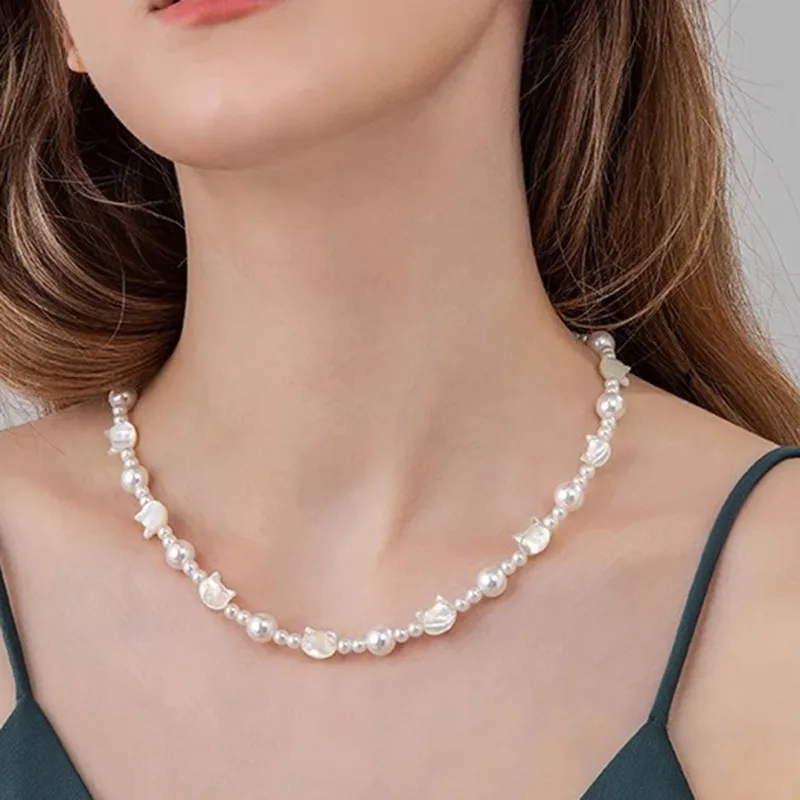 

Minar Cute White Shell Cat Head Simulated Pearl Pendant Necklaces for Women Silver Plated Copper Strand Chokers Pendientes 2024