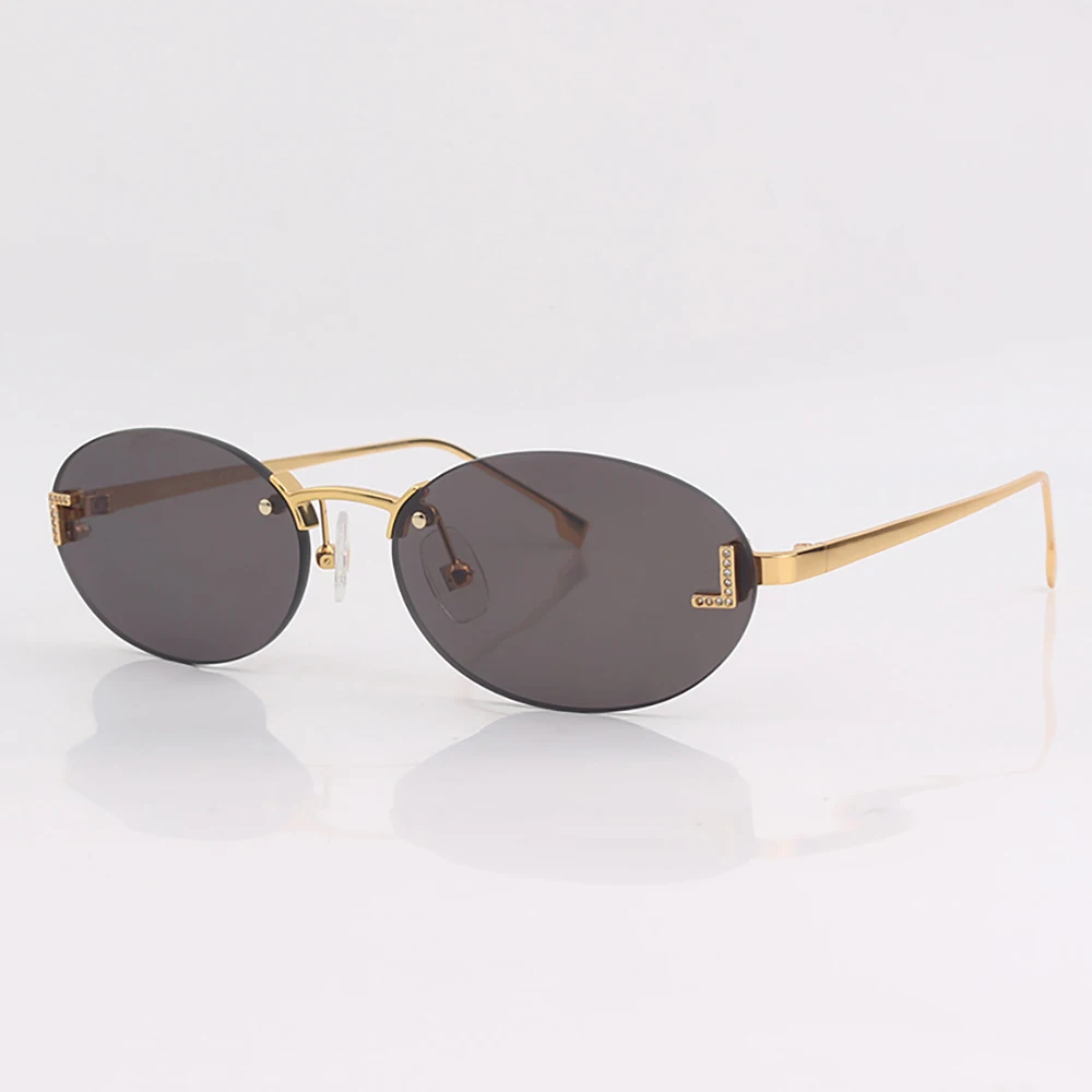 Gold metal frame Men's and women's sunglasses Fashion Rimless Oval cat eye sunglasses for Unisex Outdoor UV protective_voghion.com