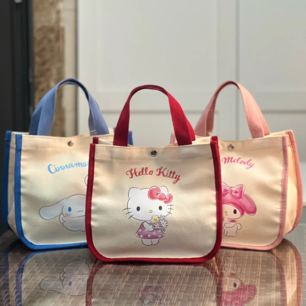 

Kawaii Sanrio Hello Kitty Cinnamoroll My Melody Canvas Handbag Lunch Bag Anime Tote Bag Girls Stationery Snack Storage Bags