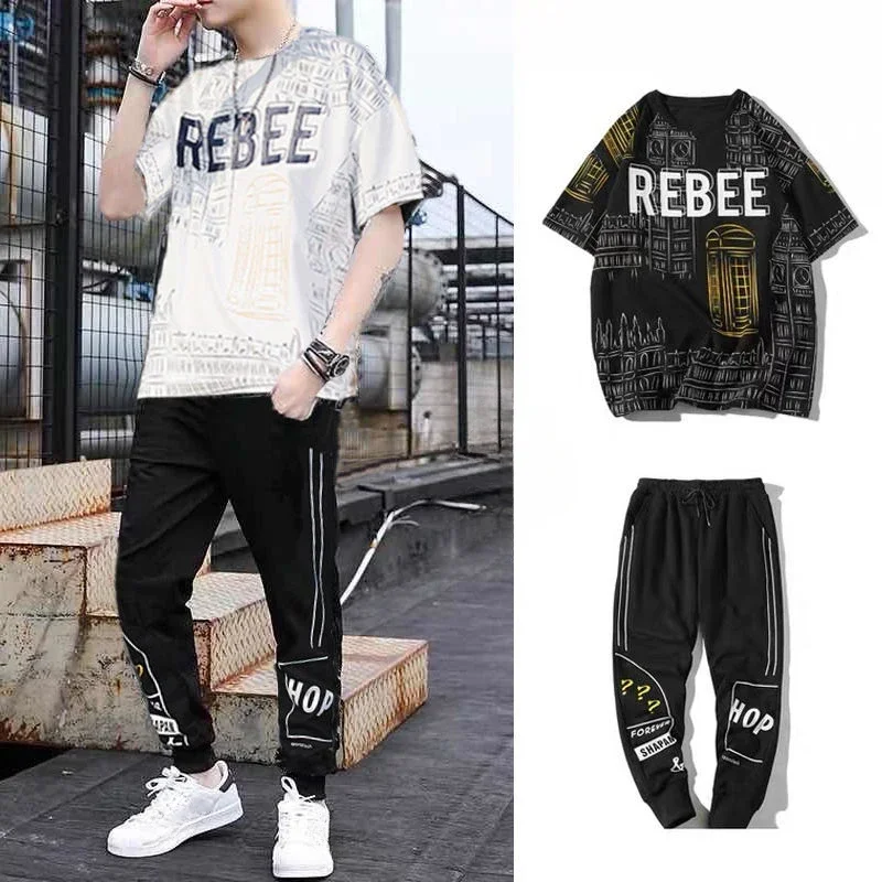 thumbnail image 1 of Conjuntos de pantalones y camisetas con estampado gráfico para hombre, pantalones de nailon para hombre, conjunto de dos piezas coreano estético negro, trajes XL elegantes, 1 of 4