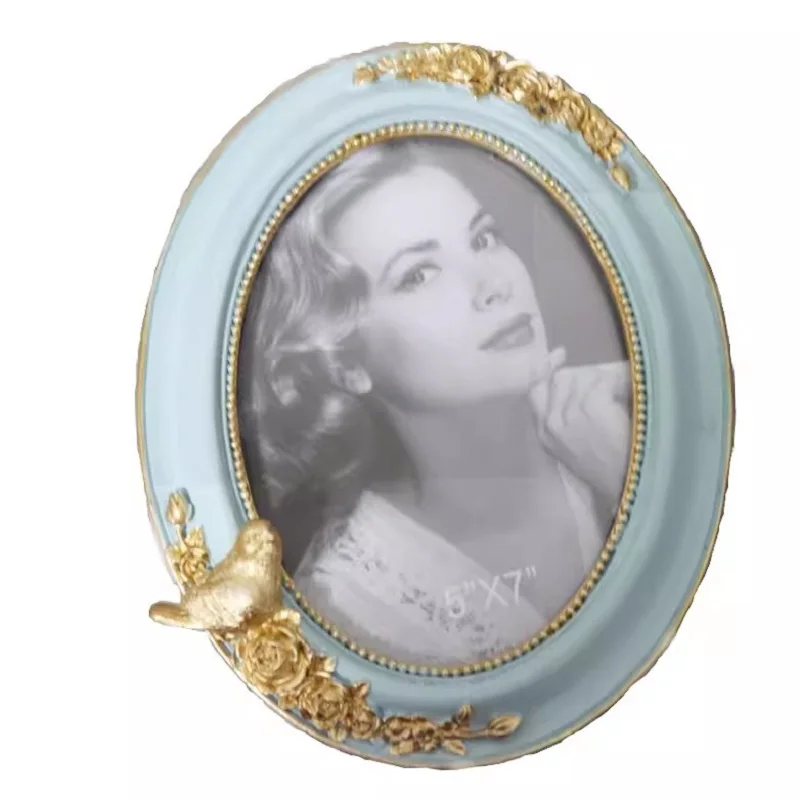 elegant-blue-painted-golden-bird-oval-photo-frame-ornament-french-light-luxury-and-fresh-home-decoration-picture-frame