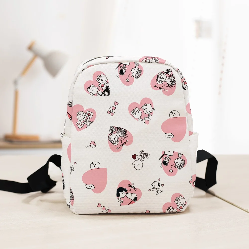 thumbnail image 1 of Miniso Snoopy Charlie Brown Bolso de hombro de lona con estampado de dibujos animados Mochila pequeña Mochila de viaje Mochila de ocio para regalo de cumpleaños, 1 of 5