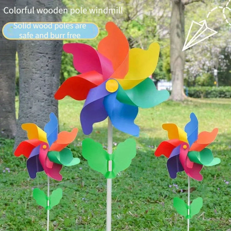 Colorful windmill outdoor decoration festival scenic park children holding rotating wooden color windmill windmill toys garden windmill