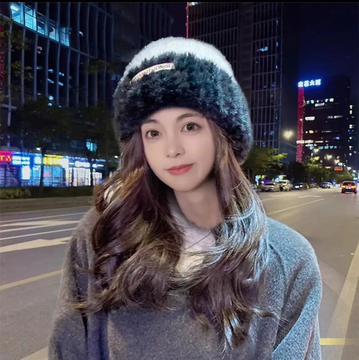 

Korean version of winter warm windproof loose knitted hat plush ear protection big head round hat women's woolen hat