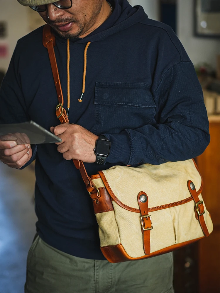 Fashion vintage casual luxury canvas first layer leather men's messenger bag business outdoor travel designer shoulder bag