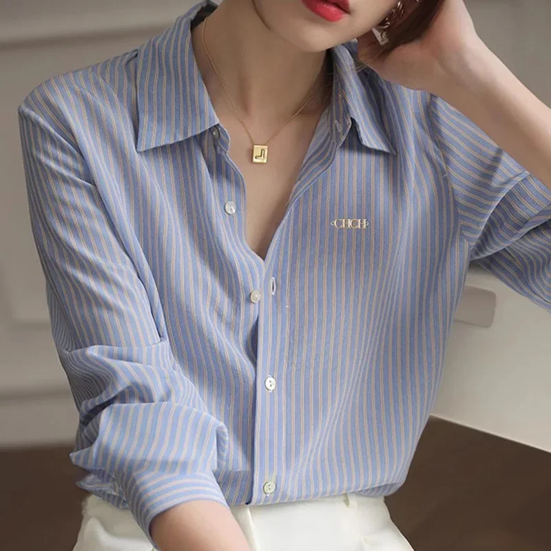 รูปสินค้า เสื้อคลาสสิกวินเทจ แขนยาว ลายทาง สง่างาม สำหรับสาวออฟฟิศ