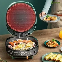New household electric baking pan with double - sided heating, non - stick for making pancakes, a breakfast machine. 1