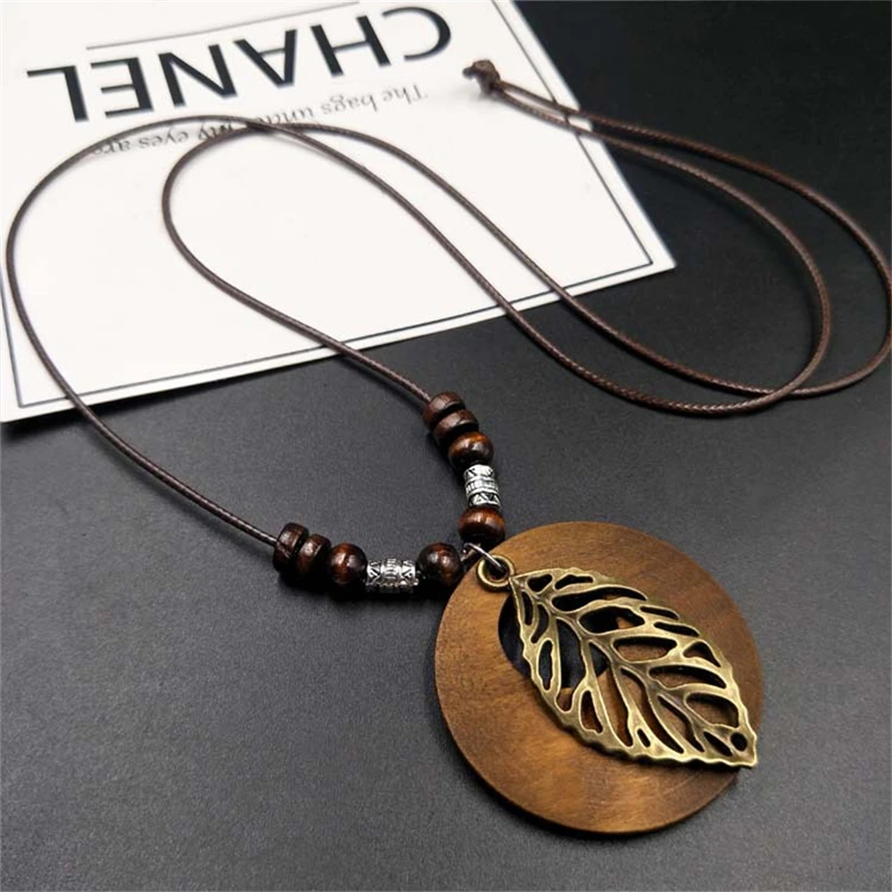 

Vintage Wooden Owl Leaf Pendant Necklaces Boho Ethnic Style Metal Hollow leaves Necklaces Long Wax Rope Chain For Women Gifts