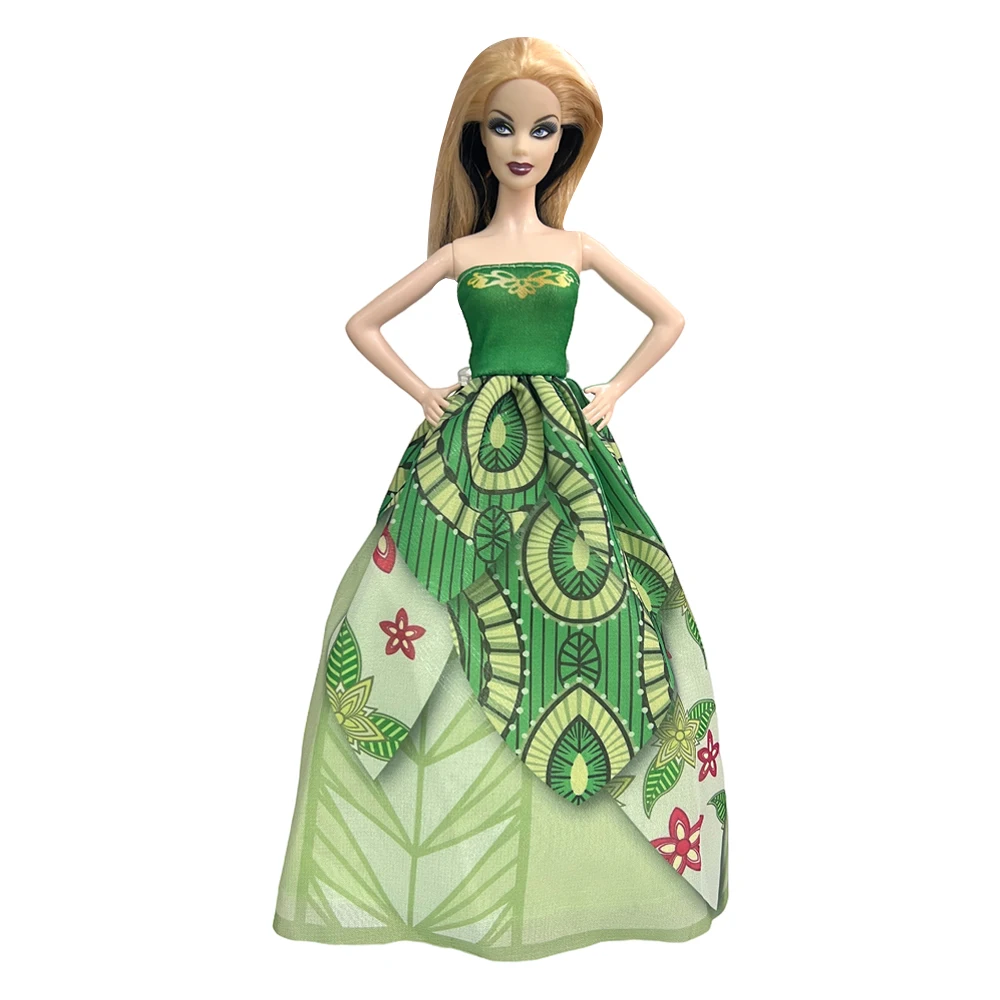 Premium Photo | A model of a barbie doll with a green dress and a bow.