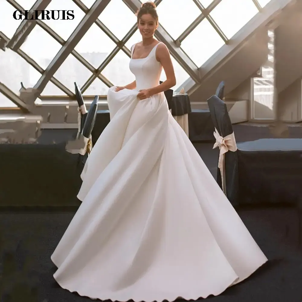 

2022 Ball Gowns Princess Wedding Dresses Sleeveless Backless Boat Neck Satin White Dresses Robe De Soirée De Mariage