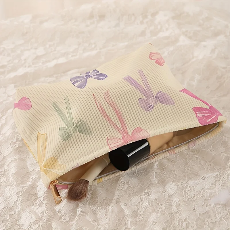 Minimally designed bow pattern printed corduroy zipper makeup bag, lightweight and multifunctional cosmetic storage bag