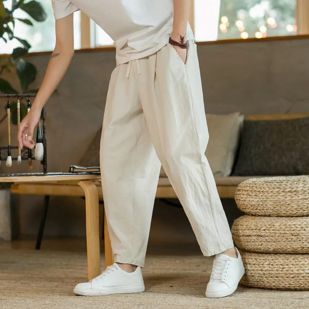Description Picture 4 of itemMen Pants Solid Color Loose Straight Drawstring Elastic Waist Pockets Trousers Ankle Length Casual Sweatpants Long Trousers