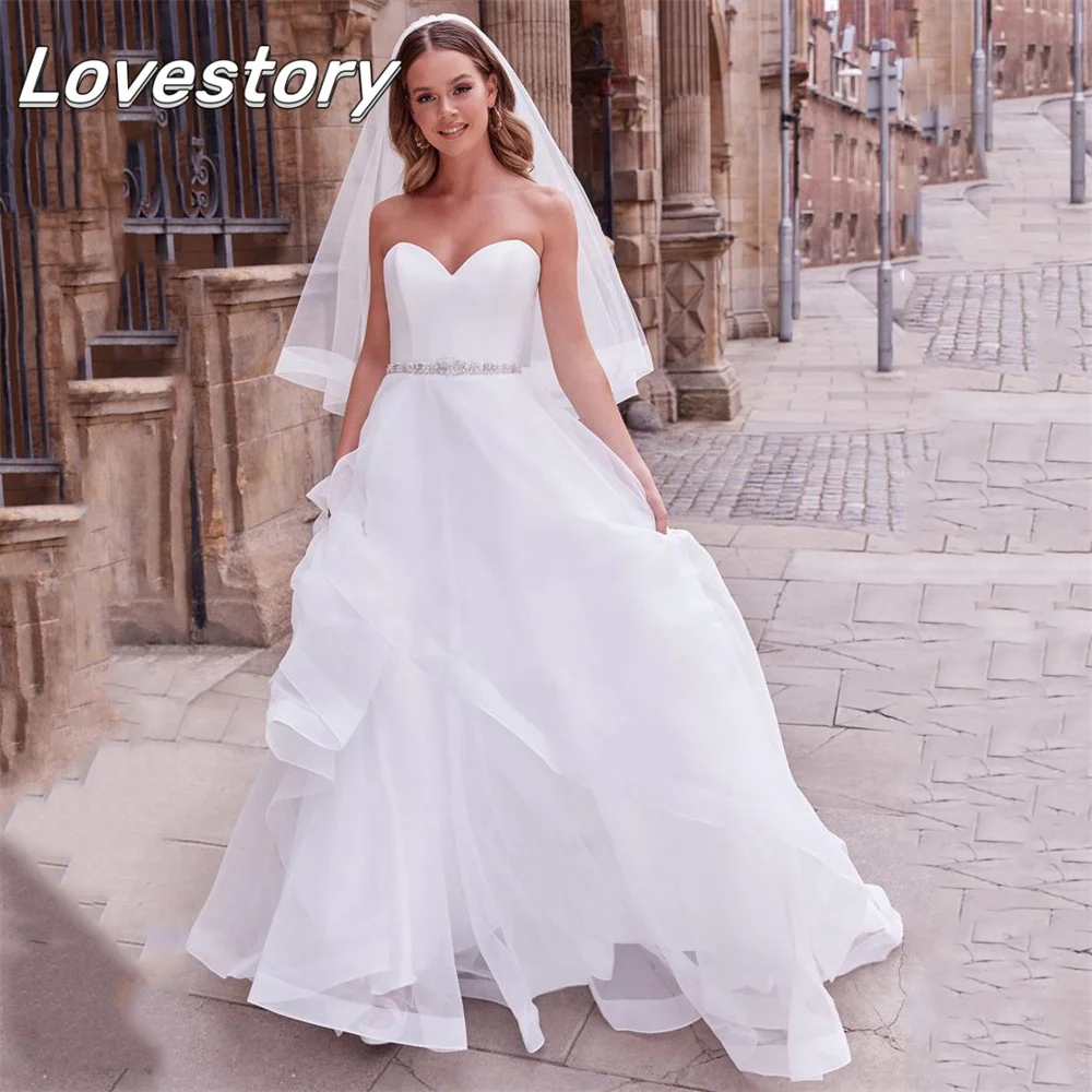 

Красивое свадебное платье А-силуэта без рукавов, платье невесты с вырезом сердечком и бисером, свадебное платье с открытой спиной и пуговицами, свадебные платья