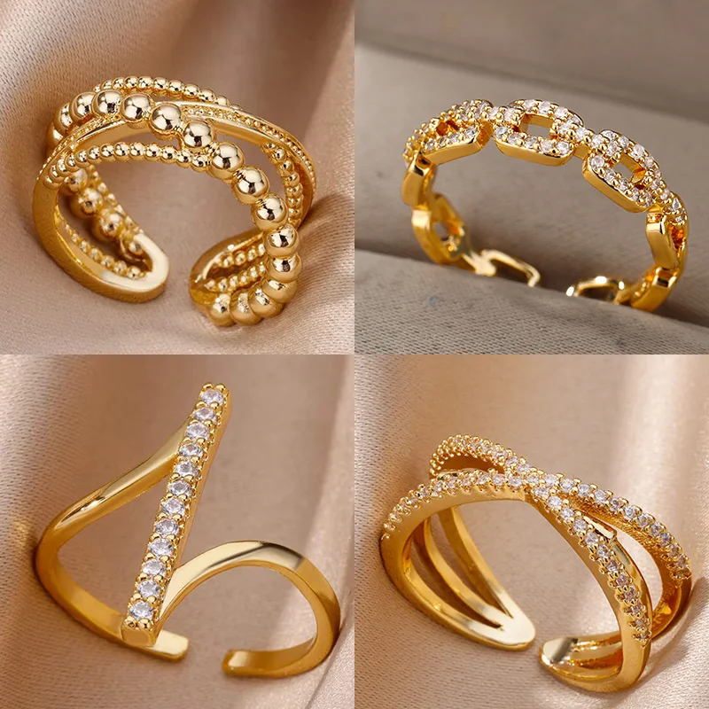 Anillo geométrico de circonitas dorado