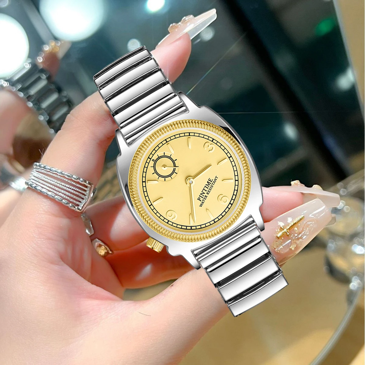 Elegant Women's Quartz Wristwatch with Spring Strap and Refined Design