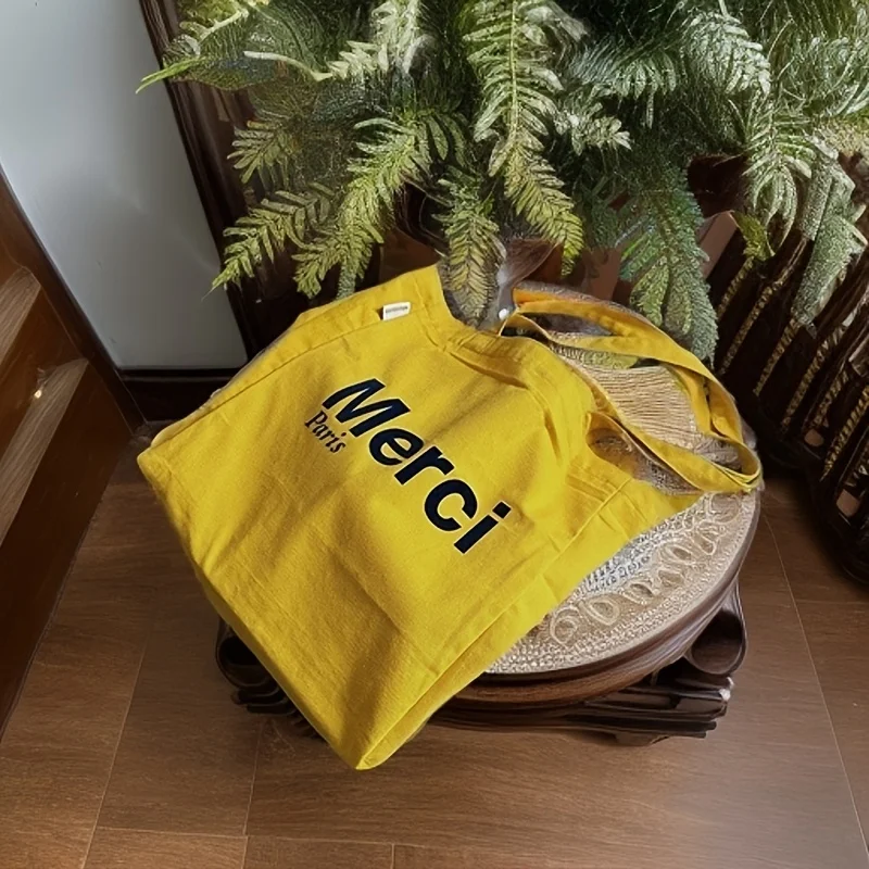 Gelbe Canvas-Einkaufstasche mit großer Kapazität, tragbare Pendler-Handtasche für Studenten, Büroangestellte, vielseitige Einzelschultertasche, Heim-Shoppi
