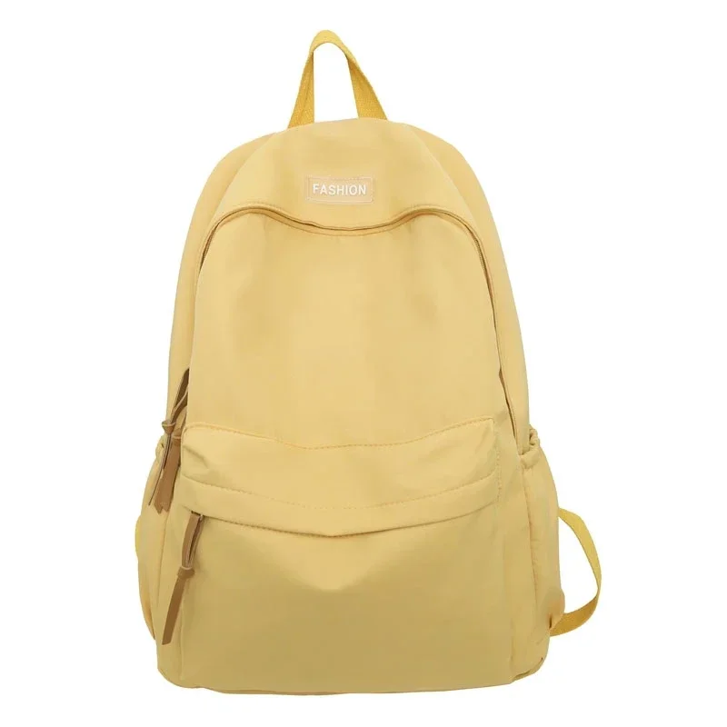 thumbnail image 1 of Mochila de nailon ligera y moderna de color sólido versátil de gran venta 2024, nueva mochila escolar informal de alta capacidad, 1 of 5
