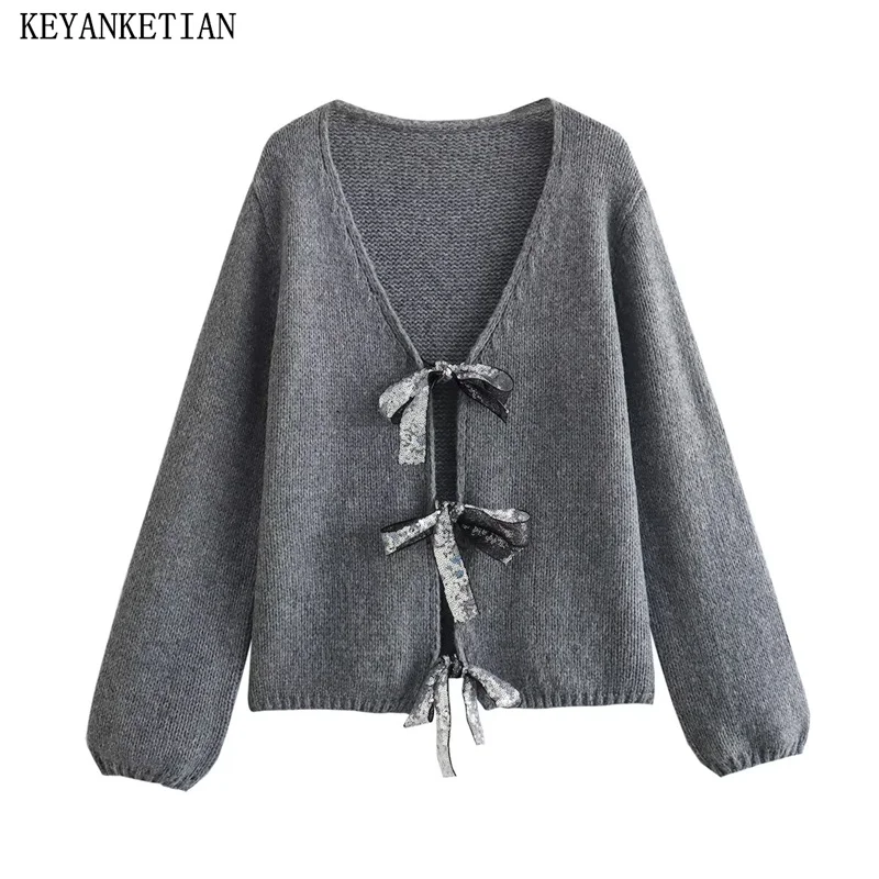 

Новинка 2024, Женский блестящий топ KEYANKETIAN с бантом, яркий праздничный Свободный укороченный Блестящий трикотажный топ серого цвета для женщин