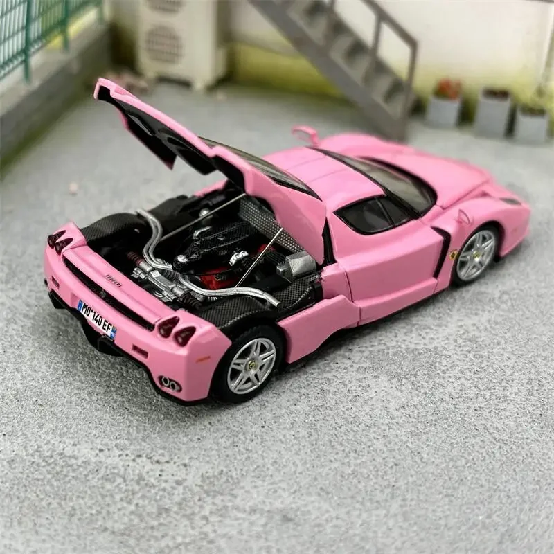 

King Model 1:64 Enzo Pink with figure Diecast Model Car