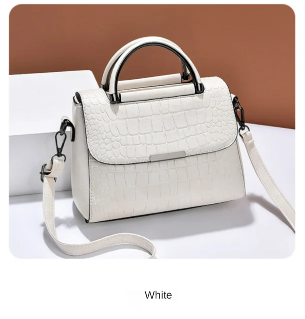 2023 New Mini Handbag Fashion PU Leather LV Handbag Ladies Shoulder Bag LV  Bright Girl Bag - China Wholesale Replicas Bags and Tote Bag price