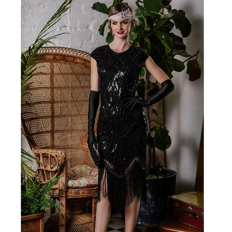 スパンコールのゴージャスなイブニングドレス♩.• きらびやかなスパンコールのついたドレス,レトロな女性の