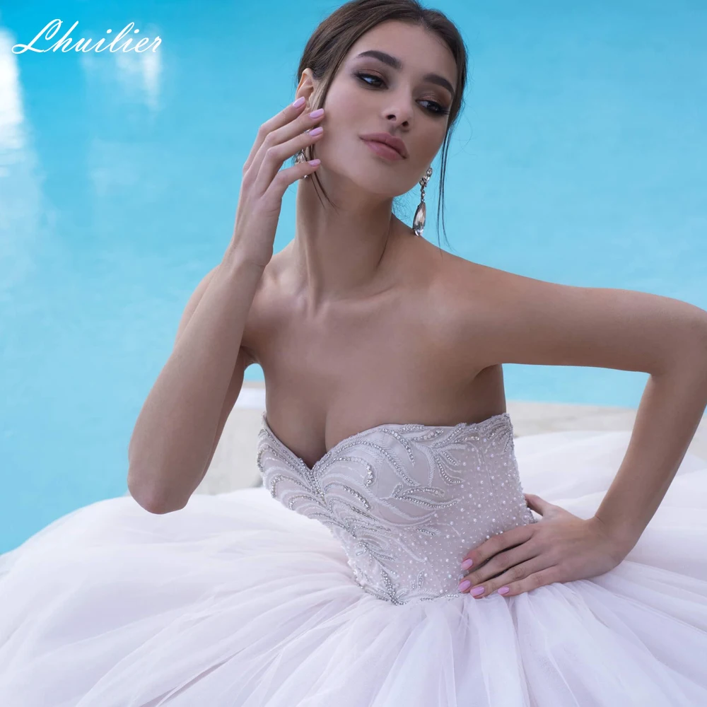 

Lhuillier Strapless A Line Pearls Beaded Tulle Wedding Dresses Floor Length Princess Sleeveless Bridal Dress with Chapel Train