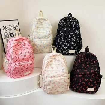Zaino per studenti con tracolla regolabile in nylon con stampa fiocco da 3 pezzi/set alla moda di grande capacità 1