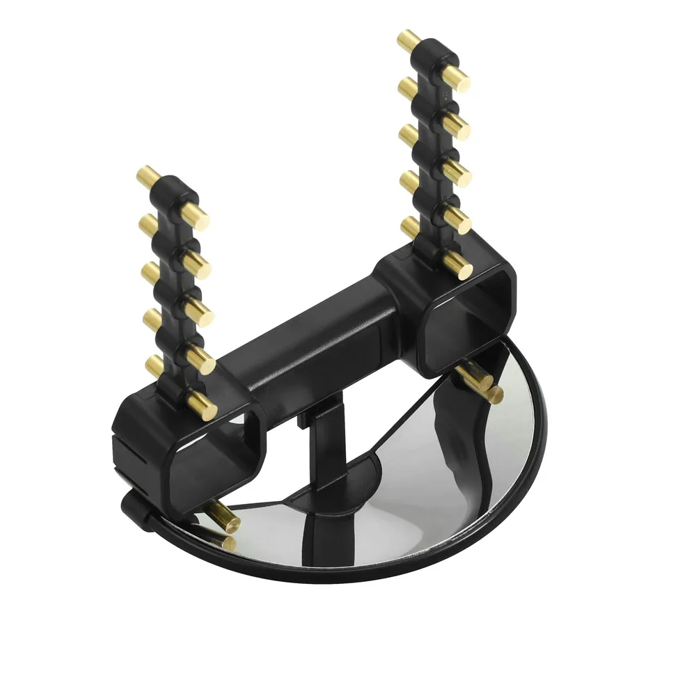 Détail de la fixation de l'amplificateur de signal sur la télécommande DJI, clipsé solidement sous la manette.