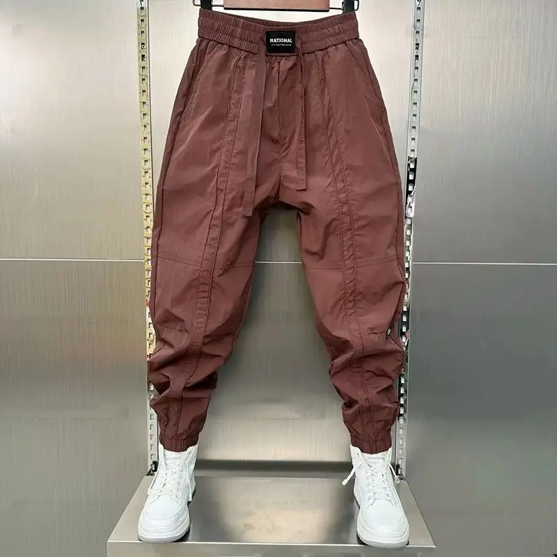 Spring Summer New Solid Color Fashion Elastic Waist Ankle Length Pants Man High Street Pockets Drawstring Patchwork Trousers