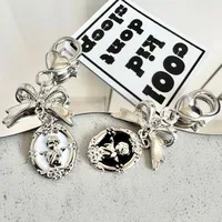 Porte-clés nœud d'ange pour femmes, pendentif de sac en métal Vintage, tendance fille coeur porte-clés voiture porte-clés ami Couple cadeaux 1