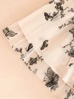 Une robe décontractée et à la mode à manches longues avec un motif papillon et un patchwork en tulle pour le printemps et l'automne 6