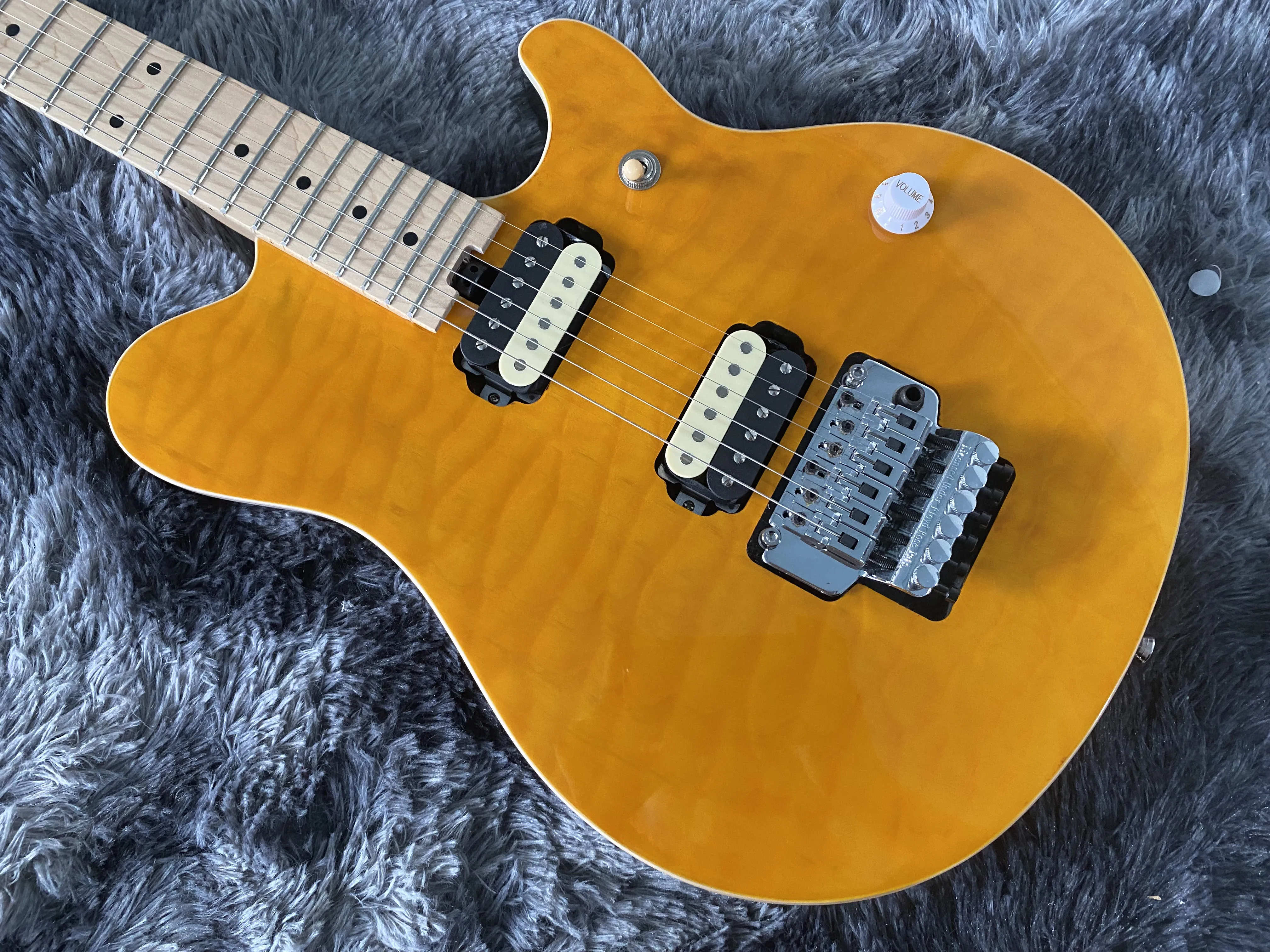 

China Electric Guitar Transpraint Yellow Red and Blue Color Flame Maple Top 6 String Tremolo System