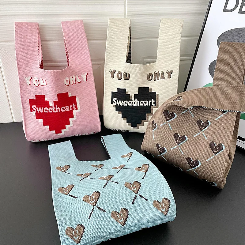 

Bag Female Korean Version of Niche Design Girl Pink Love Knitted Handbag Hand Bag Student Underarm Vest