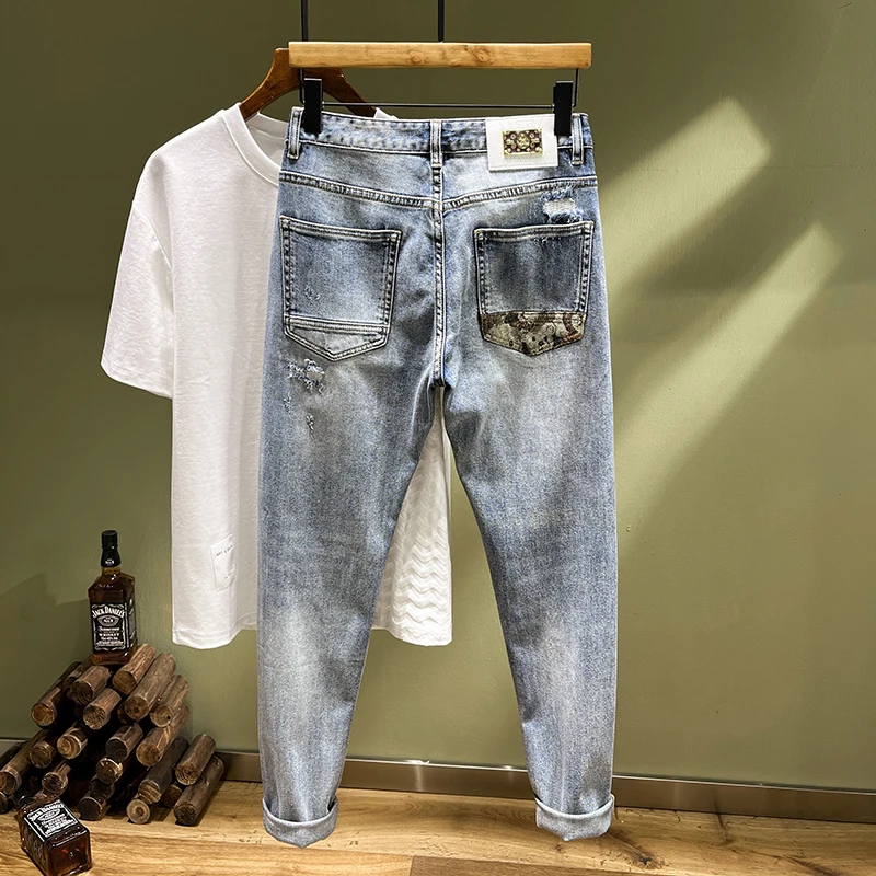 Splicing men's jeans broken holes embroidery patches personalized street Korean version of the elastic Slim small leg pants