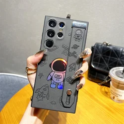 Luxury Laser Engraved Leather Astronaut Wrist Strap Holder Shockproof Back Cover - GalaxyS23Ultra(6.8