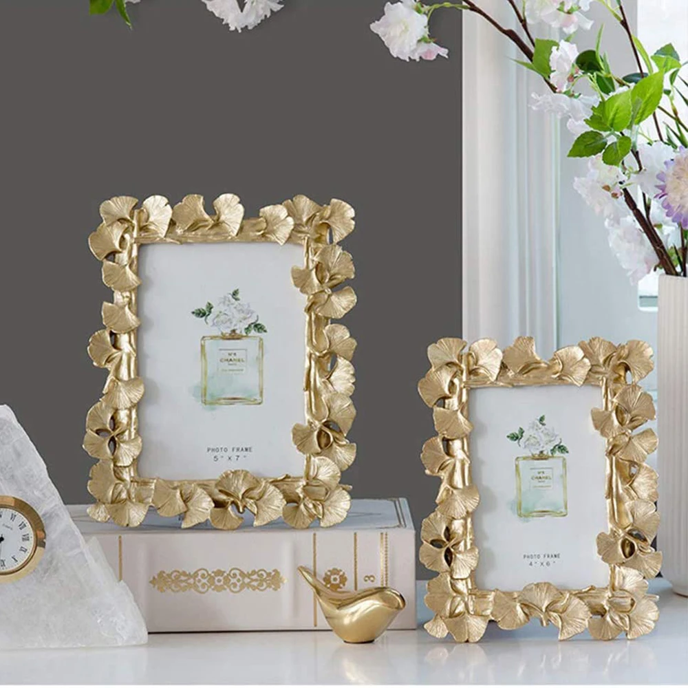 

Golden ginkgo leaf photo frame ornaments Nordic wedding photography European retro resin photo frame ornaments