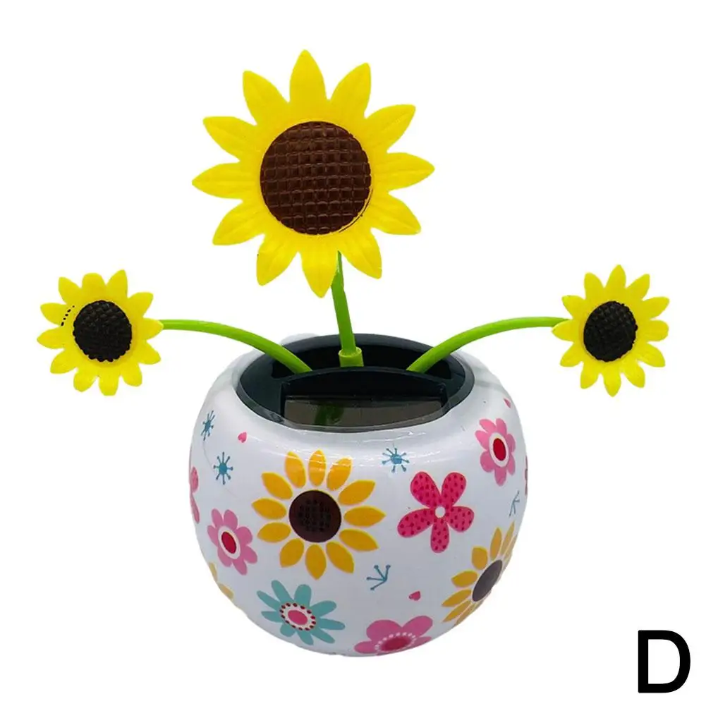 thumbnail image 1 of Adorno solar de girasol con forma de flor danzante y cabeza móvil para coche, ideal para decorar el salpicadero del dormitorio y el hogar., 1 of 5