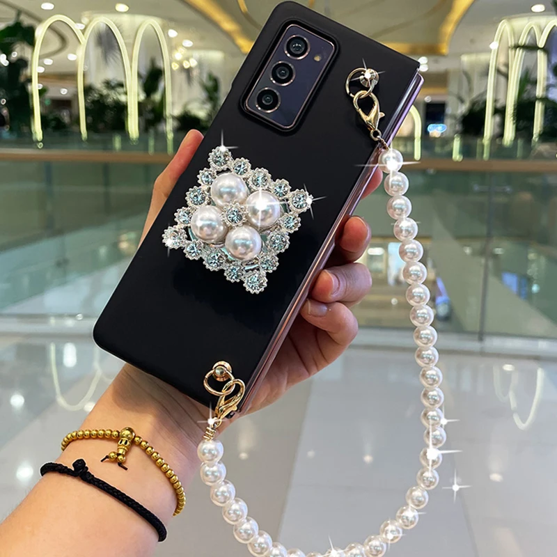 

Franch Style Conque For Samsung Galaxy Z Fold 4 3 2 5G Bling Diamond Rhinestone Stand Holder Case ZFold 5 Pearl Hand Chain Cover