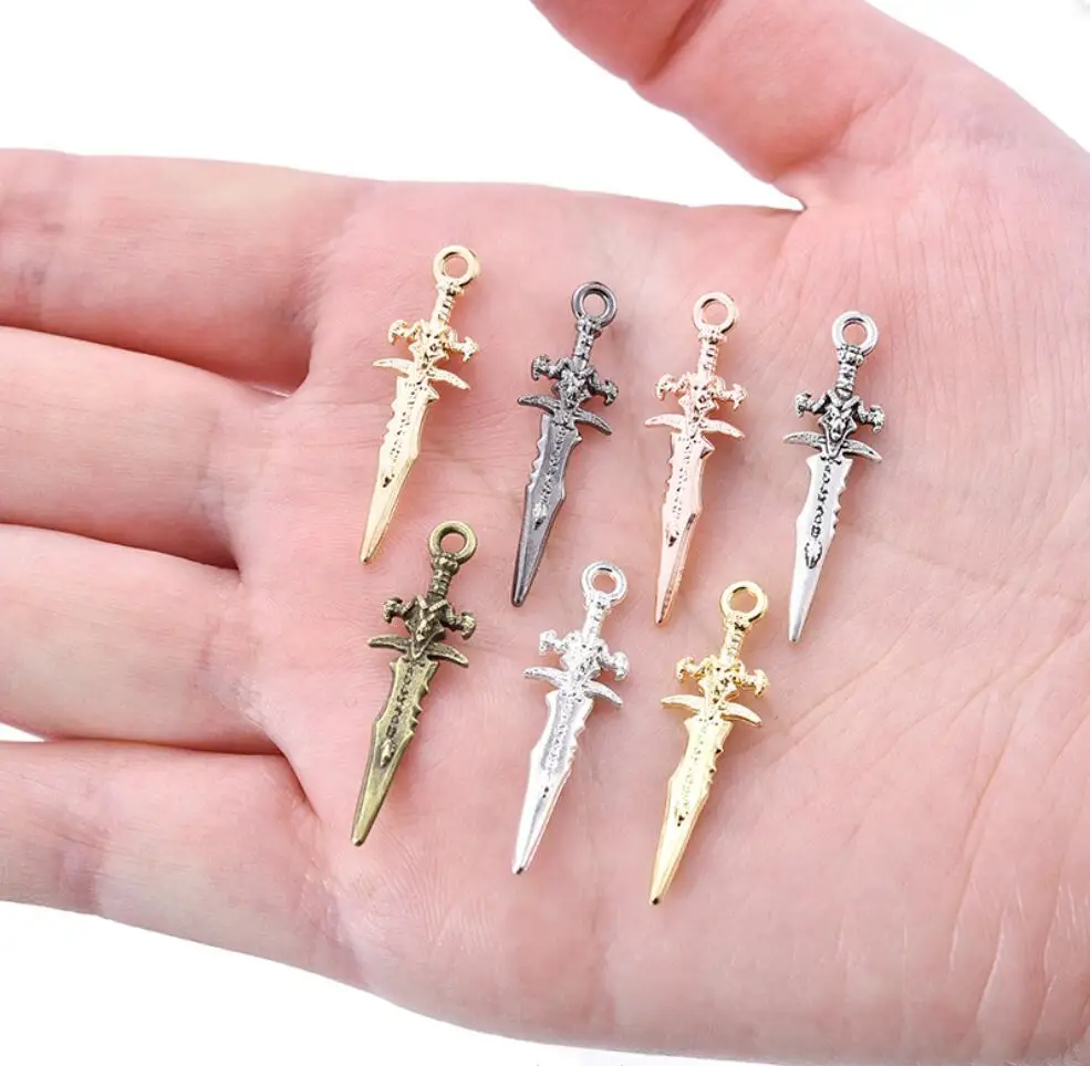 130PCS 31*9mm Alloy Antique Knight Sword Knife Gun Bow Charms For Jewelry Making DIY Handmade Weapons Pendant F0036