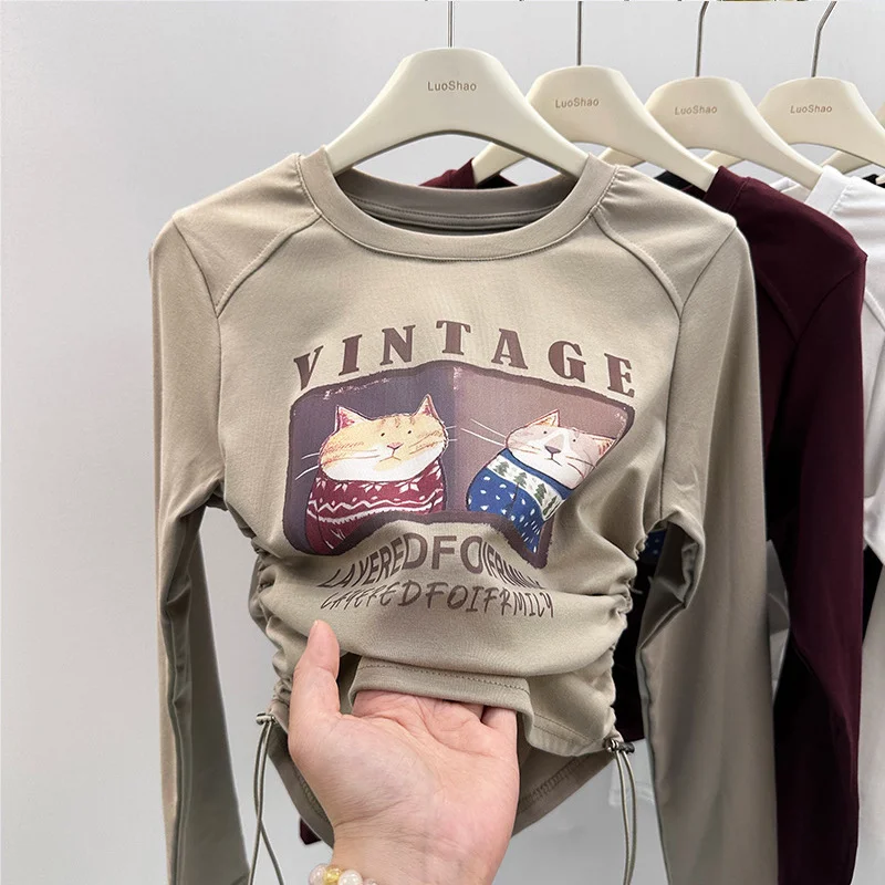 

Long Sleeved T Shirt Female Drawstring Cartoon Letters Printed Bottoming Shirt Inside Collision Color Inserted Shoulder Tops