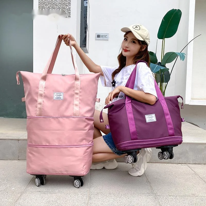 https://ae01.alicdn.com/kf/S063b1e1540874b31ba6f01e9845e898b5/Double-Layer-Foldable-Storage-Bag-With-Wheels-Large-Capacity-Portable-Luggage-Bags-Waterproof-Dry-Wet-Oxford.jpg