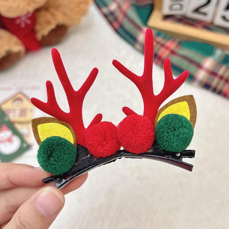 Colorful pom-pom antler hair clip