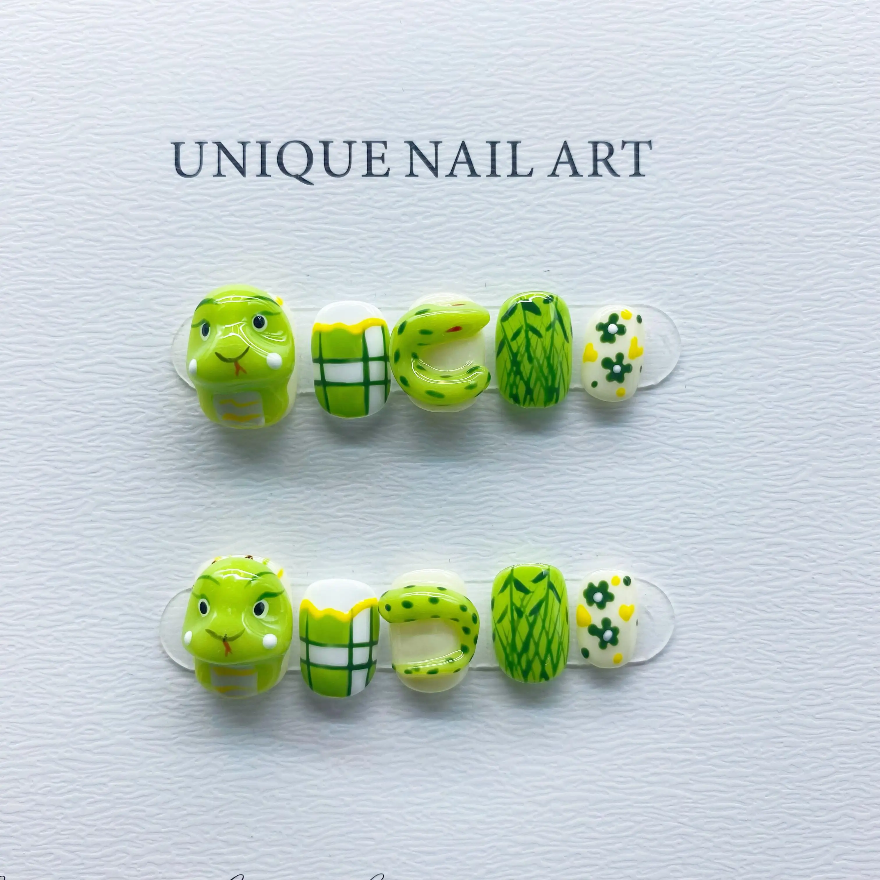 

Wholesale Charming Zodiac Serpent Hand-Sculpted Detachable Reusable High-Quality Whitening Handcrafted Press On Nails.No.D139