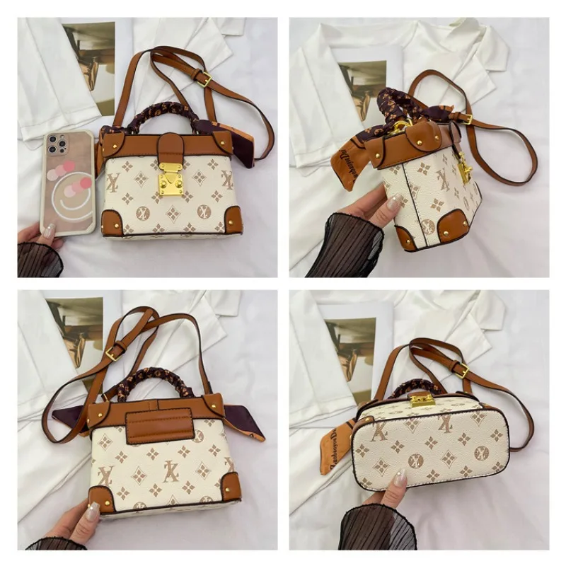 حقيبة صندوقية صغيرة بتصميم متخصص، تتميز بمظهر عصري...