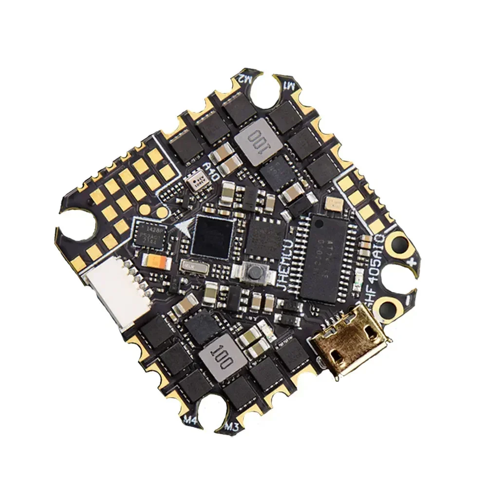 Capteur de courant FPV 40A connecté à une carte de vol, câbles de puissance et signal bien en évidence.