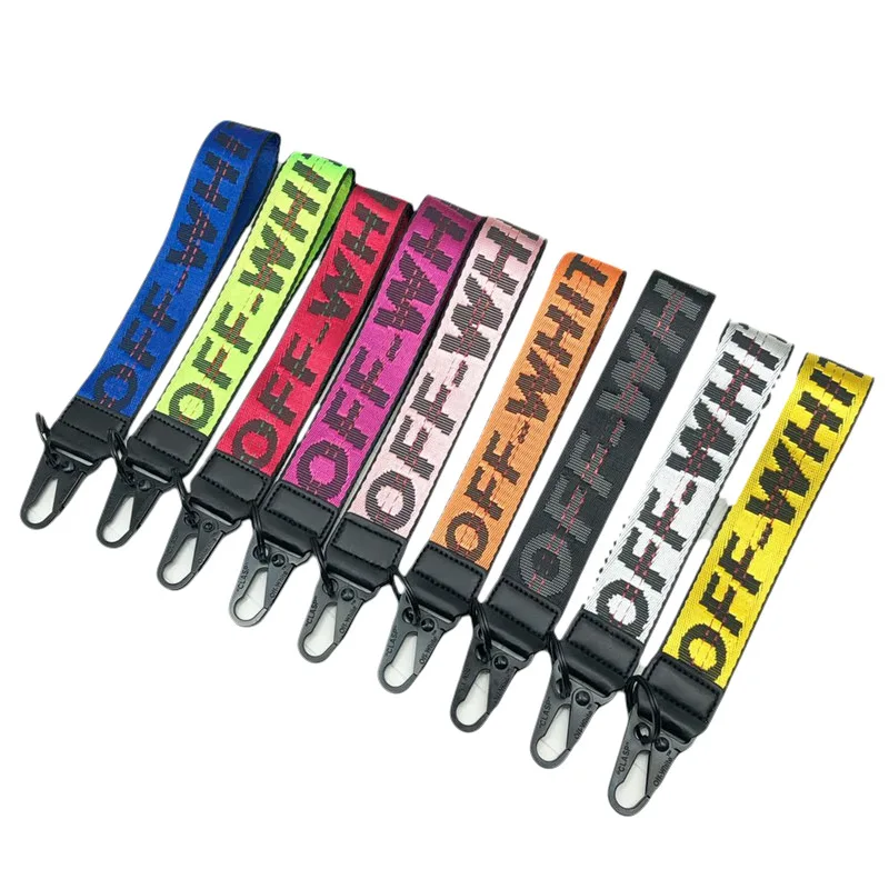 

European and American white key chain yellow canvas embroidered English letters European and American mobile phone pendant.