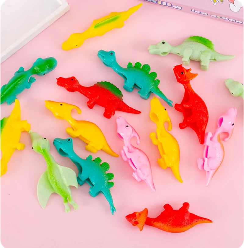 5Pcs Funny Slingshot Dinosaur Toy Birthday Party Surprise Gifts