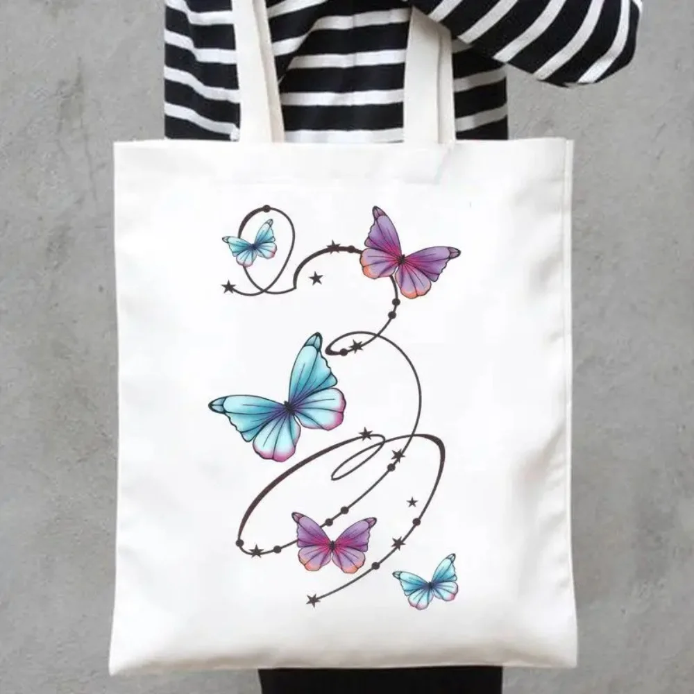 Ink Splash dunkelblaue Aquarell-Schmetterlings-Grafik-Tragetasche aus Segeltuch, große Umhängetasche für Damen, tägliche Einkaufstasche, lässige Reisetasche