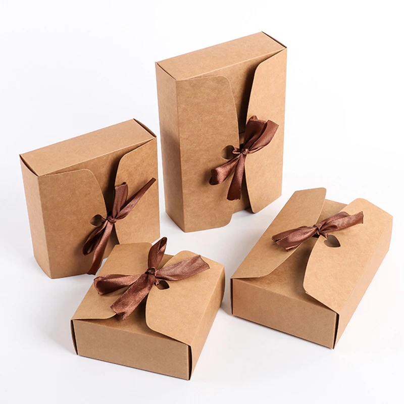 Premium Photo  Design your gift beautiful gift box in kraft brown paper on  dark background