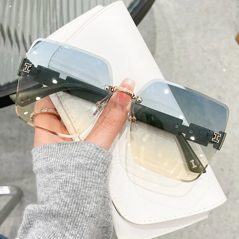 

2023 New Fashion Frameless Trimmed Women's Sunglasses, Sunglasses, UV Resistant Sunglasses, UV400 Brand Design Classic